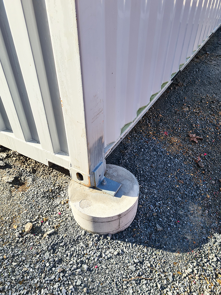 Ballast vs Concrete Footings for Container Shelter